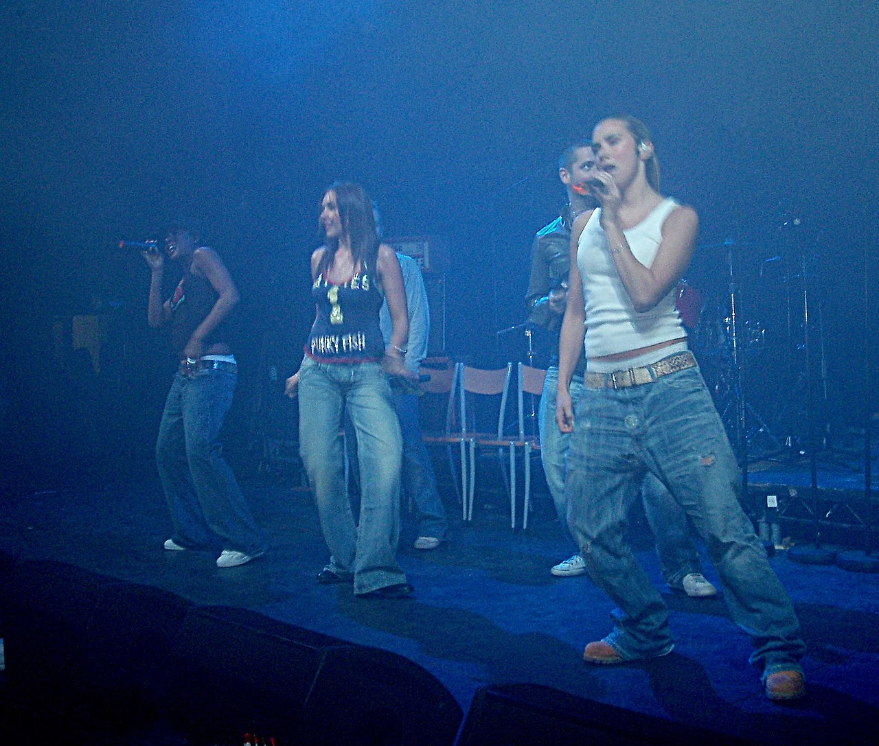 Michelle Heaton performing on stage with Liberty X